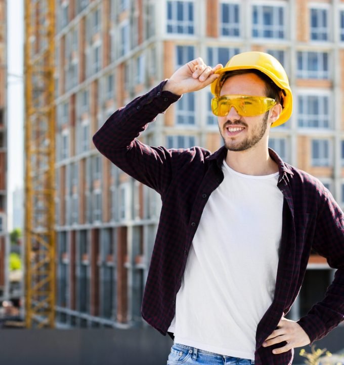medium-shot-portrait-architect-looking-away About_Us